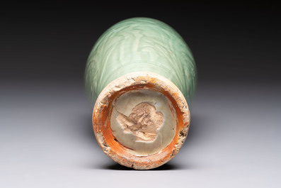 A Chinese Longquan celadon vase with incised floral design, Transitional period