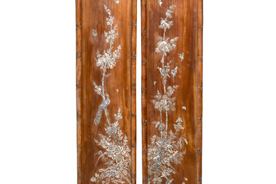 A set of four Chinese or Vietnamese mother-of-pearl-inlaid hongmu panels depicting birds among flowering branches, 19th C.