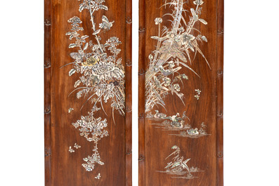 A set of four Chinese or Vietnamese mother-of-pearl-inlaid hongmu panels depicting birds among flowering branches, 19th C.