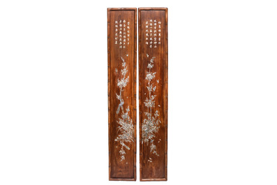 A set of four Chinese or Vietnamese mother-of-pearl-inlaid hongmu panels depicting birds among flowering branches, 19th C.