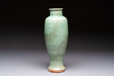 A Chinese Longquan celadon vase with incised floral design, Transitional period