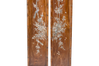 A set of four Chinese or Vietnamese mother-of-pearl-inlaid hongmu panels depicting birds among flowering branches, 19th C.