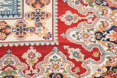 An exceptional and large embroidered silk 'Shahnameh' carpet, signed Musa Baft Tabriz, Tabriz, Iran, 20th C.