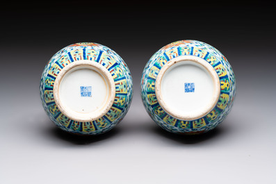 A pair of Chinese doucai 'Hu' vases with lotus scroll design, Qianlong mark, 19th C.