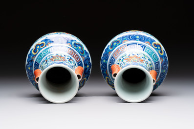 A pair of Chinese doucai 'Hu' vases with lotus scroll design, Qianlong mark, 19th C.