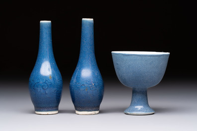 A pair of Chinese blue-glazed 'Hatcher Cargo' vases with incised dragons and a stem cup, Transitional period