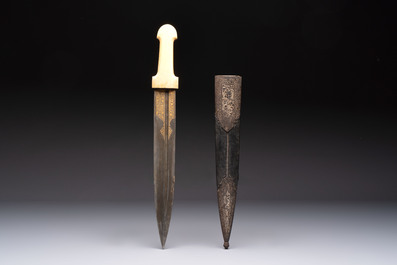 A Caucasian gilt Damascus steel 'Khinjal' with a whale bone hilt and a leather and damascened steel scabbard, 19th C.