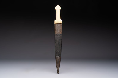 A Caucasian gilt Damascus steel 'Khinjal' with a whale bone hilt and a leather and damascened steel scabbard, 19th C.