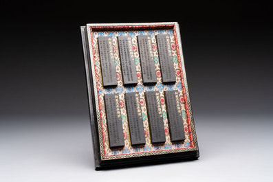 A set of eight Chinese 'Yu Zhi Min Sheng Zai Qin Shi 御製民生在勤詩' ink cakes with a gilt-lacquered 'dragon' box, Hu Kaiwen 胡開文 mark, 20th C.