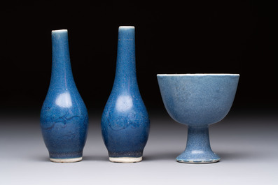 A pair of Chinese blue-glazed 'Hatcher Cargo' vases with incised dragons and a stem cup, Transitional period