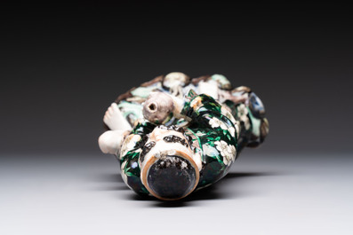 A pair of Chinese famille verte covered jars, a Tieguai Li figure, a blue and white teapot and a biscuit saucer, Kangxi and Qing Yu Tang mark, 19th C.