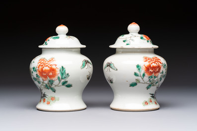 A pair of Chinese famille verte covered jars, a Tieguai Li figure, a blue and white teapot and a biscuit saucer, Kangxi and Qing Yu Tang mark, 19th C.