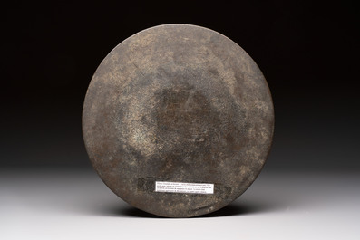 Two Chinese bronze mirrors, one inscribed &lsquo;Fu Shan Shou Hai 福山壽海' and the other with sea animals and grape design, Qing