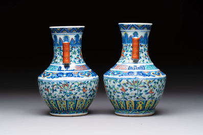 A pair of Chinese doucai 'Hu' vases with lotus scroll design, Qianlong mark, 19th C.