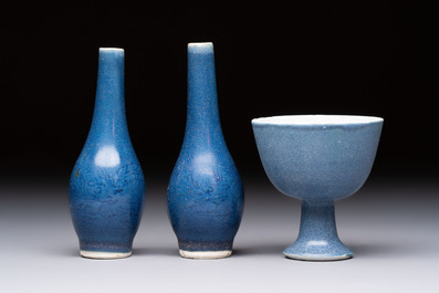A pair of Chinese blue-glazed 'Hatcher Cargo' vases with incised dragons and a stem cup, Transitional period