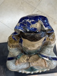 A large Chinese polychrome-glazed Shiwan stoneware figure of Guanyin, 19th C.