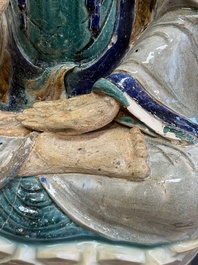 A large Chinese polychrome-glazed Shiwan stoneware figure of Guanyin, 19th C.