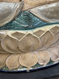 A large Chinese polychrome-glazed Shiwan stoneware figure of Guanyin, 19th C.