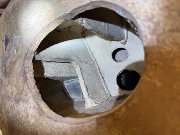 A large Chinese polychrome-glazed Shiwan stoneware figure of Guanyin, 19th C.