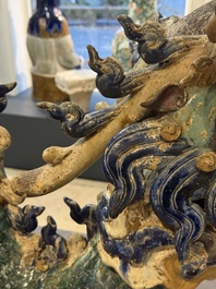 A pair of large Chinese polychrome-glazed Shiwan stoneware dragons, 19th C.