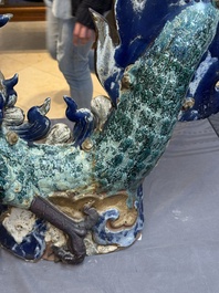 A pair of large Chinese polychrome-glazed Shiwan stoneware dragons, 19th C.