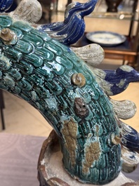 A pair of large Chinese polychrome-glazed Shiwan stoneware dragons, 19th C.