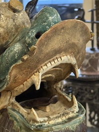 A large Chinese polychrome-glazed Shiwan stoneware dragon, 19th C.