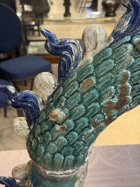 A pair of large Chinese polychrome-glazed Shiwan stoneware dragons, 19th C.