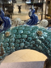 A pair of large Chinese polychrome-glazed Shiwan stoneware dragons, 19th C.