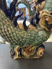 A large Chinese polychrome-glazed Shiwan stoneware dragon, 19th C.