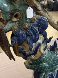 A pair of large Chinese polychrome-glazed Shiwan stoneware dragons, 19th C.
