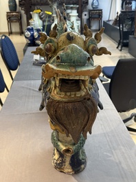 A pair of large Chinese polychrome-glazed Shiwan stoneware dragons, 19th C.