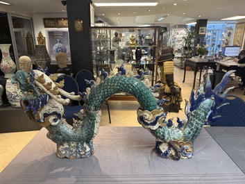 A pair of large Chinese polychrome-glazed Shiwan stoneware dragons, 19th C.