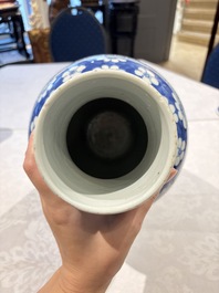 Two pairs of Chinese blue and white covered vases and a large covered vase, 19th C.