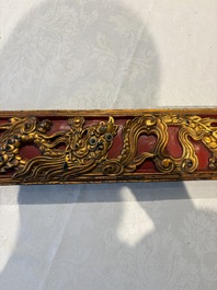 Six Chinese gilt-lacquered carved wooden panels with narrative design, 19th C.