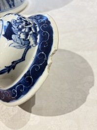 Two pairs of Chinese blue and white covered vases and a large covered vase, 19th C.