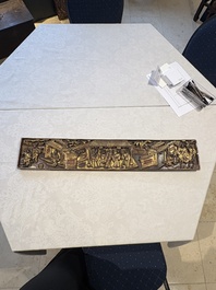 Six Chinese gilt-lacquered carved wooden panels with narrative design, 19th C.