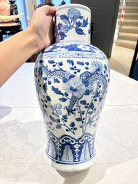 Two pairs of Chinese blue and white covered vases and a large covered vase, 19th C.