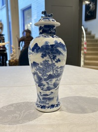 Two pairs of Chinese blue and white covered vases and a large covered vase, 19th C.