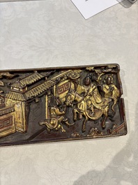 Six Chinese gilt-lacquered carved wooden panels with narrative design, 19th C.