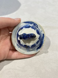Two pairs of Chinese blue and white covered vases and a large covered vase, 19th C.