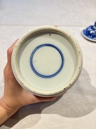 Two pairs of Chinese blue and white covered vases and a large covered vase, 19th C.