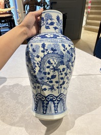 Two pairs of Chinese blue and white covered vases and a large covered vase, 19th C.