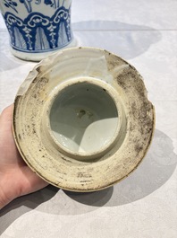 Two pairs of Chinese blue and white covered vases and a large covered vase, 19th C.