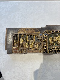 Six Chinese gilt-lacquered carved wooden panels with narrative design, 19th C.