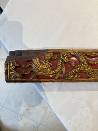 Six Chinese gilt-lacquered carved wooden panels with narrative design, 19th C.