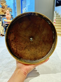 A Chinese wucai 'He He Er Xian' vase on gilt-bronze stand, 19th C.