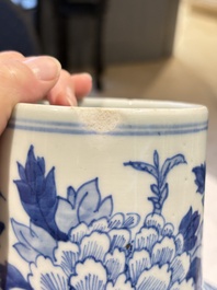 Two pairs of Chinese blue and white covered vases and a large covered vase, 19th C.