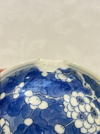 Two pairs of Chinese blue and white covered vases and a large covered vase, 19th C.