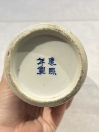 Two pairs of Chinese blue and white covered vases and a large covered vase, 19th C.